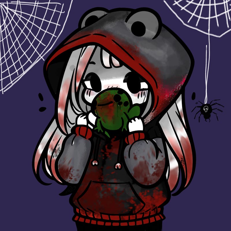 a girl holding a froggy hoodie