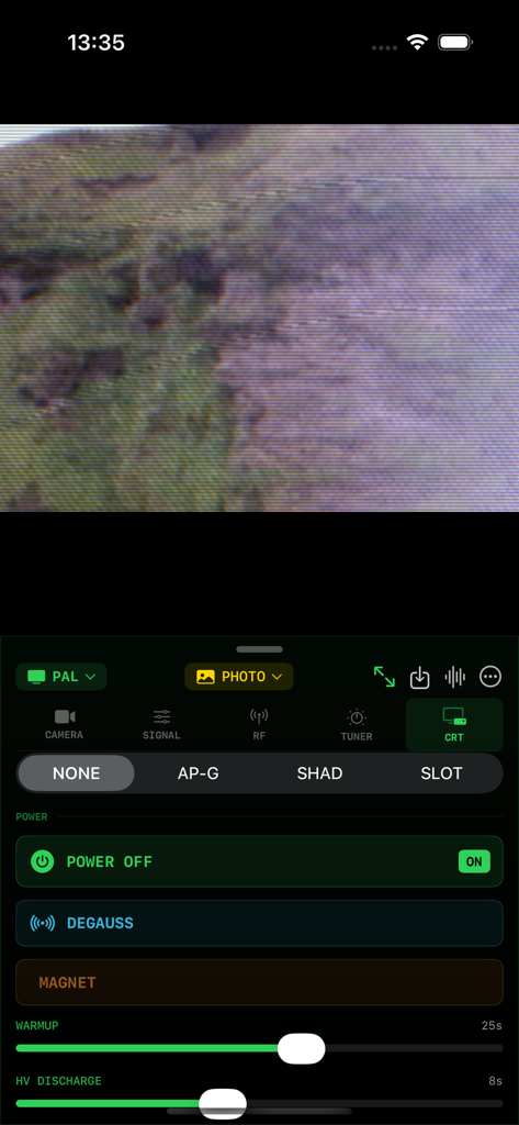 AnalogTV - The AnalogTV app interface showing a simulated CRT screen and technical controls for signal settings and hardware effects like degauss and magnet.