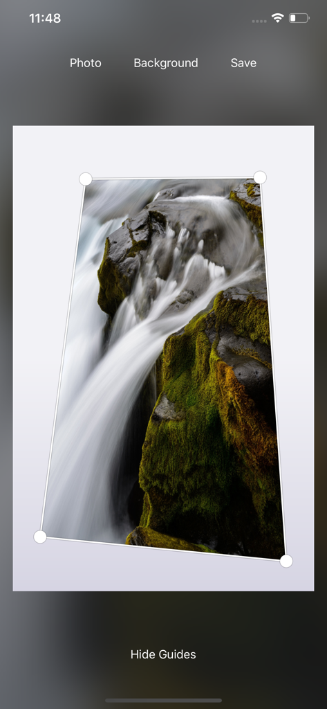 Photo Perspective - The app interface showing a waterfall photo being adjusted using manual four point perspective control