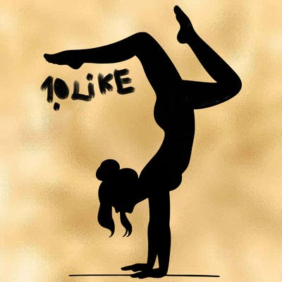 a woman doing a handstand
