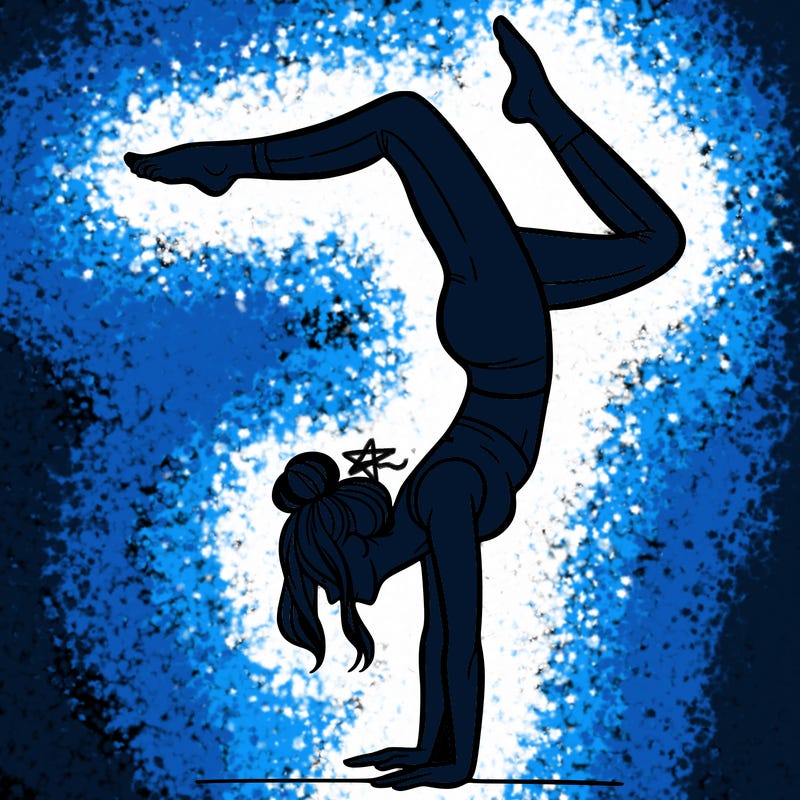 a woman doing a handstand