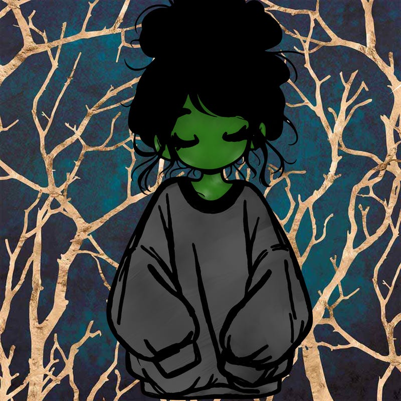 girl with baggy sweatshirt and messy bun