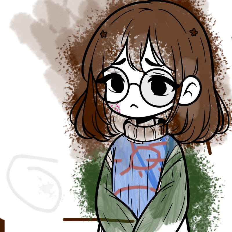 sad girl with glasses in a sweater