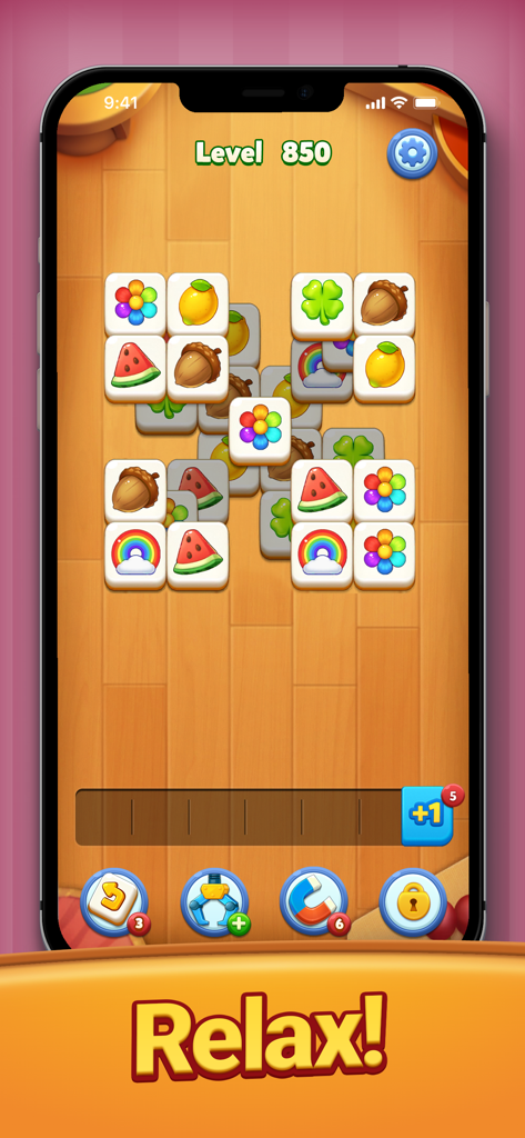 Tile Family®:Match Puzzle Game - Colorful tile matching puzzle game screen with fruit and nature icons on a wooden background with a relax banner