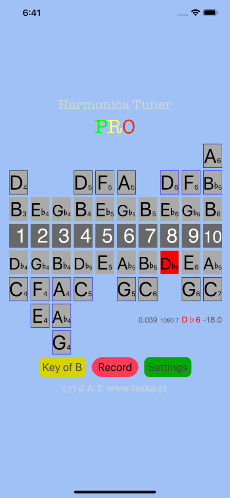 Harmonica Tuner Pro app interface displaying a 10-hole harmonica layout with blow and draw notes for tuning.