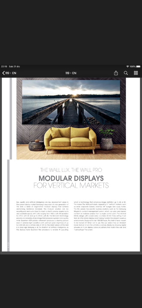 A technical article page from THE PLAN Magazine featuring modular display technology in a modern interior setting with a yellow sofa.