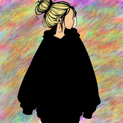 realistic girl with a oversized sweatshirt on and a bun