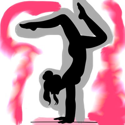a woman doing a handstand