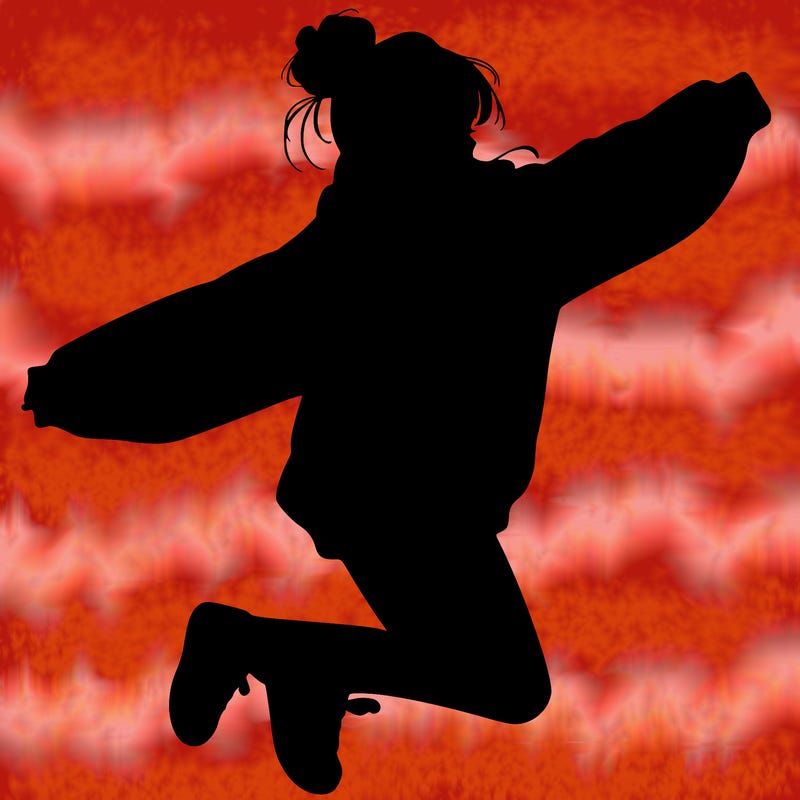 realistic girl jumping with a bun and oversized sweatshirt