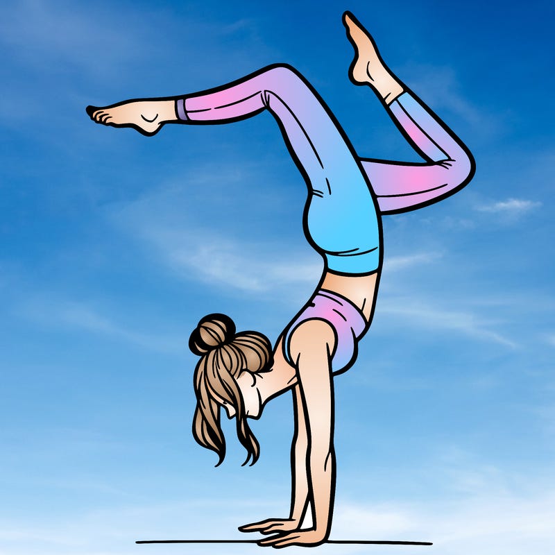 a woman doing a handstand