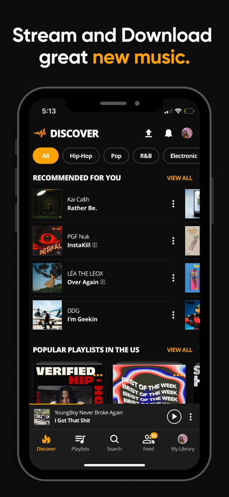 The Discover screen of the Audiomack app showing recommended hip-hop songs and popular US playlists.