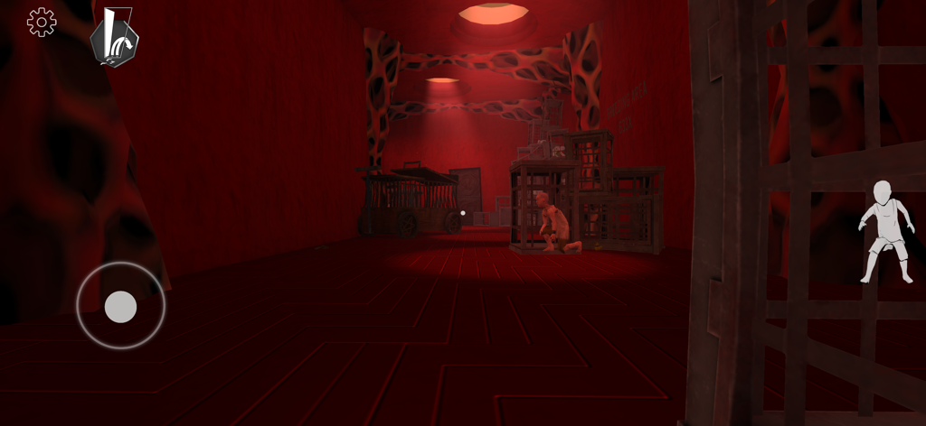 Nightmare Gate: Horror Game - A first person view of a red lit room with cages and a stealth icon in Nightmare Gate horror game