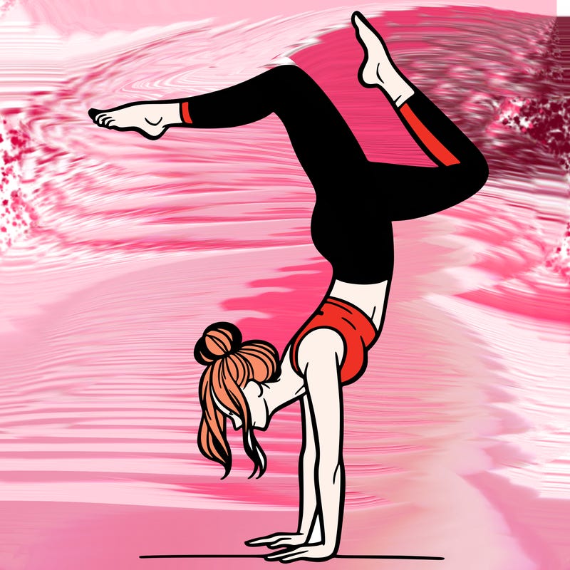 a woman doing a handstand