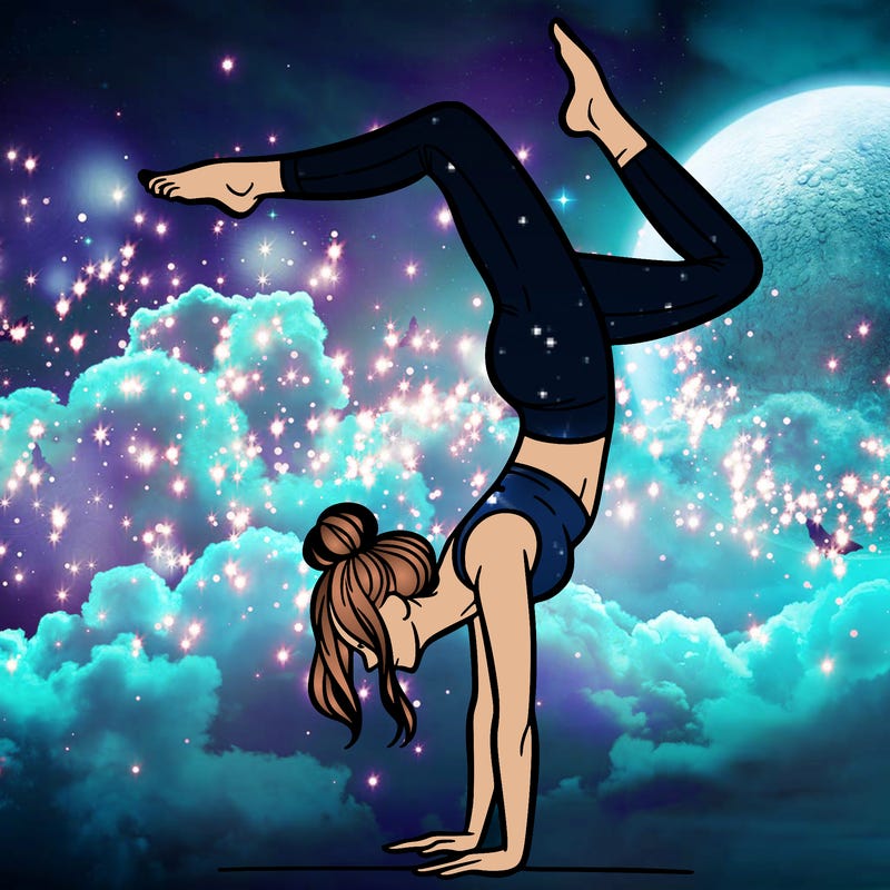 a woman doing a handstand