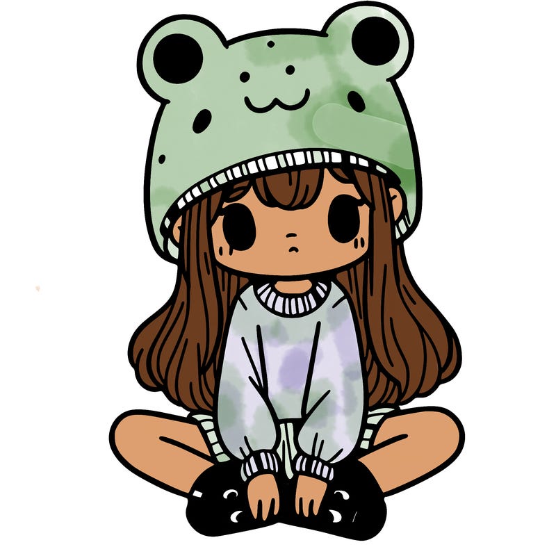 a girl wearing a frog hat and some frog socks