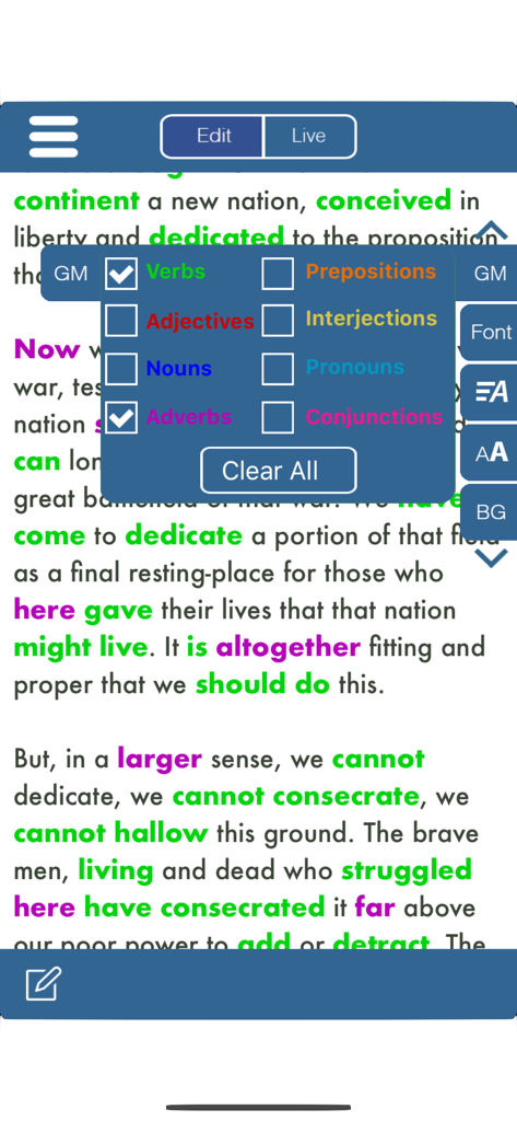 A teleprompter screen in SpeechMaker showing the Gettysburg Address with verbs and adverbs highlighted in green and purple using a color-coded grammar menu.