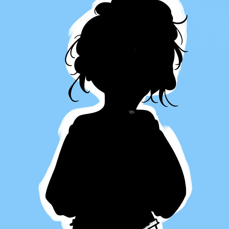 girl with a messy ponytail glasses a baggy crop top and jean shorts