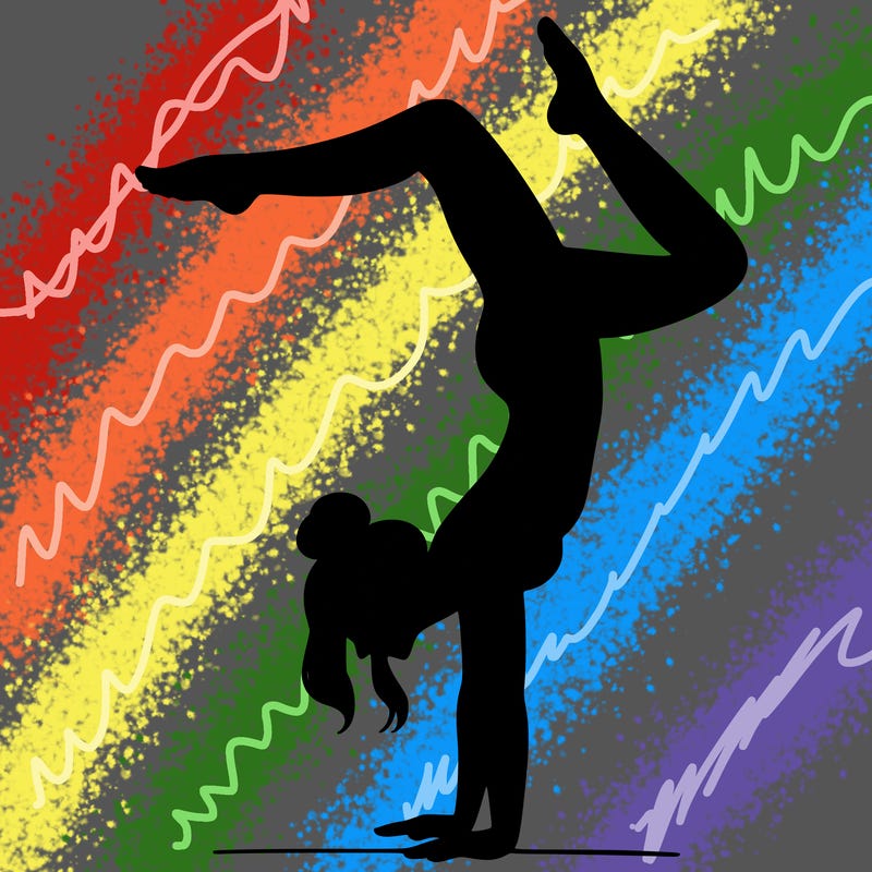 a woman doing a handstand