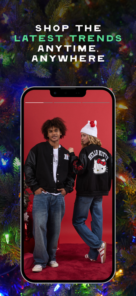 Aeropostale app screen showing teen fashion trends with a Hello Kitty holiday collection and Christmas tree background.