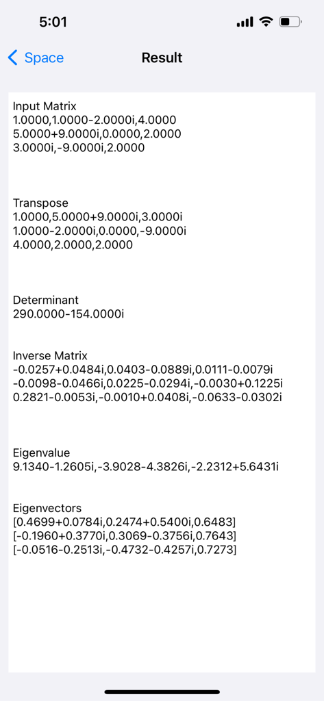 n Matrix Calculator - Results screen showing determinant inverse matrix eigenvalues and eigenvectors for a complex matrix