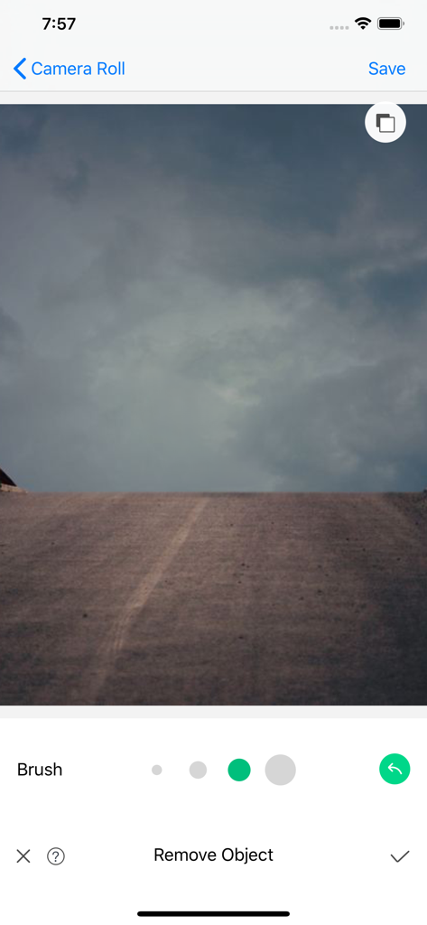 Object Removal Pro - Eraser Me - Interfaz de edición de fotos que muestra una herramienta de pincel para eliminar objetos de una imagen de paisaje
