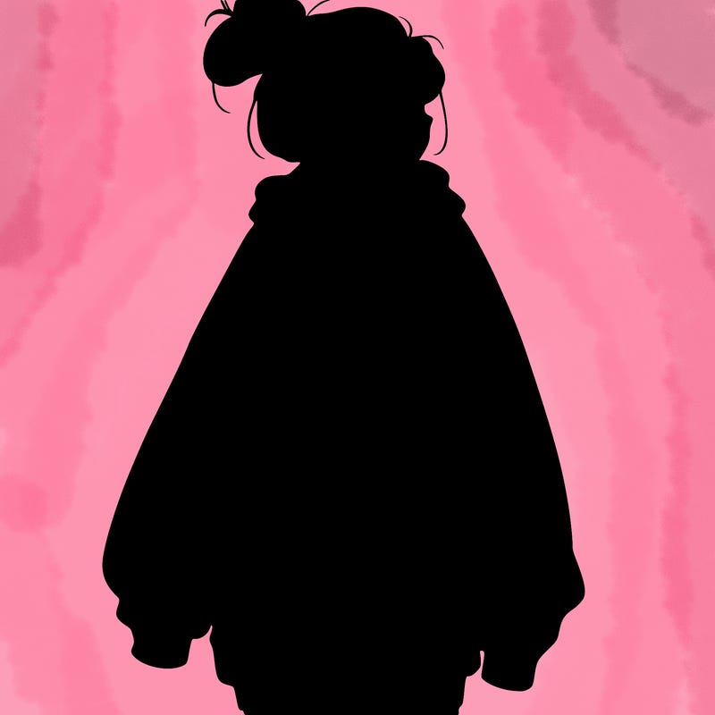 realistic girl with a oversized sweatshirt on and a bun