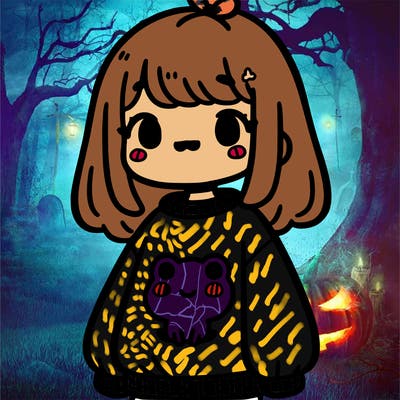 girl with a sweatshirt that has a little cute frog on it