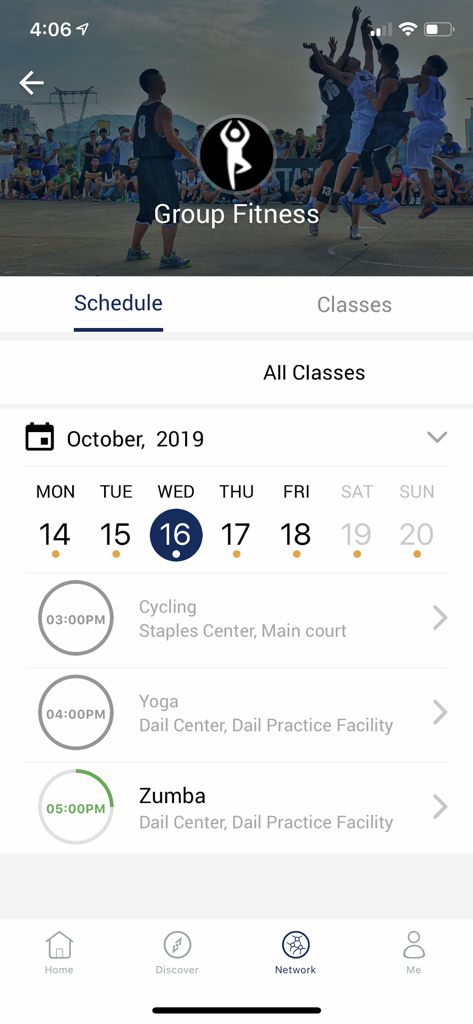 IMLeagues mobile app screen showing a schedule of group fitness classes including cycling yoga and zumba