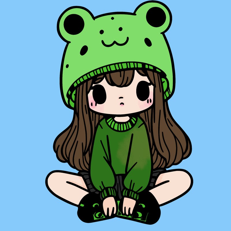 a girl wearing a frog hat and some frog socks