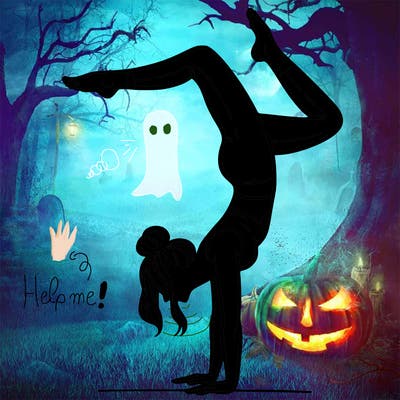 a woman doing a handstand