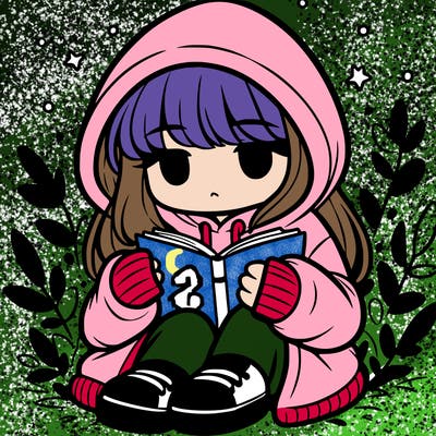 girl in oversized hoodie reading a book