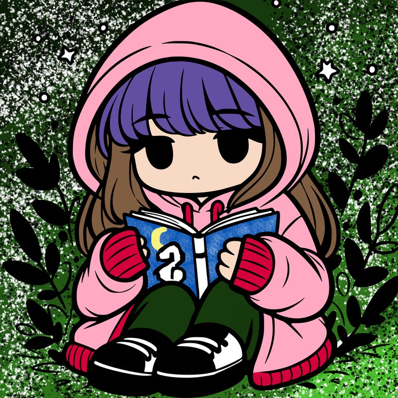 girl in oversized hoodie reading a book