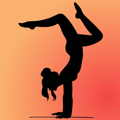 a woman doing a handstand