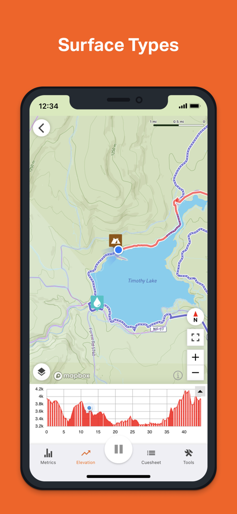 Ride with GPS: Bike Navigation - La aplicación Ride with GPS que muestra tipos de superficie de carretera y perfil de elevación en un mapa topográfico