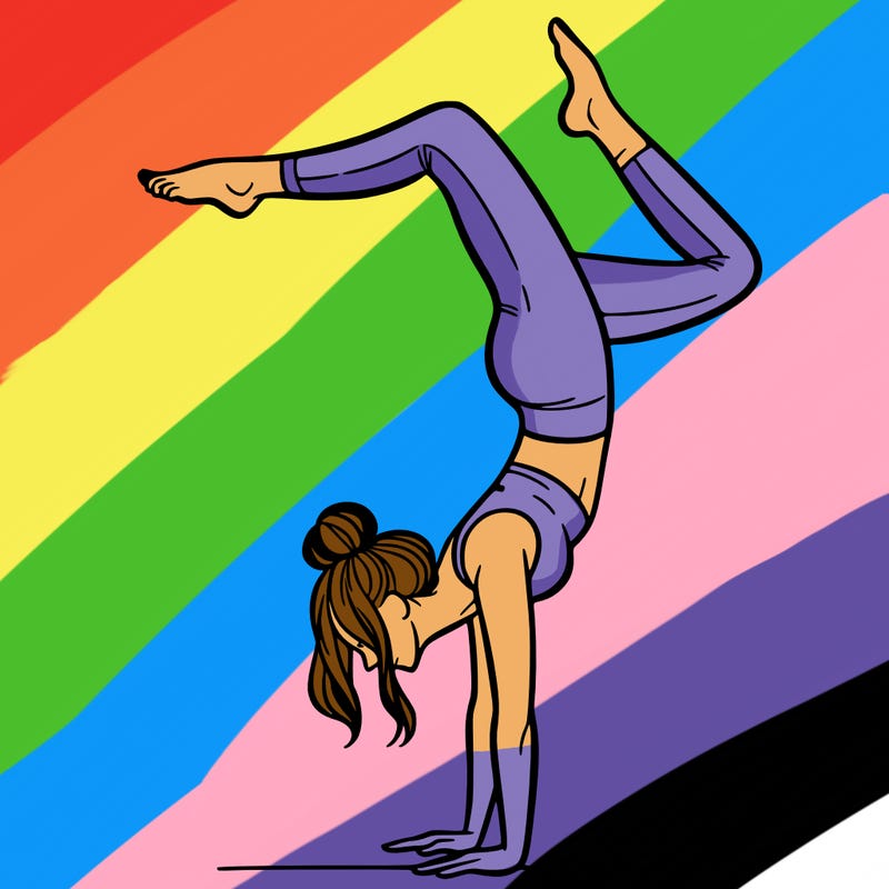 a woman doing a handstand