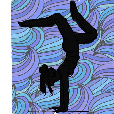 a woman doing a handstand