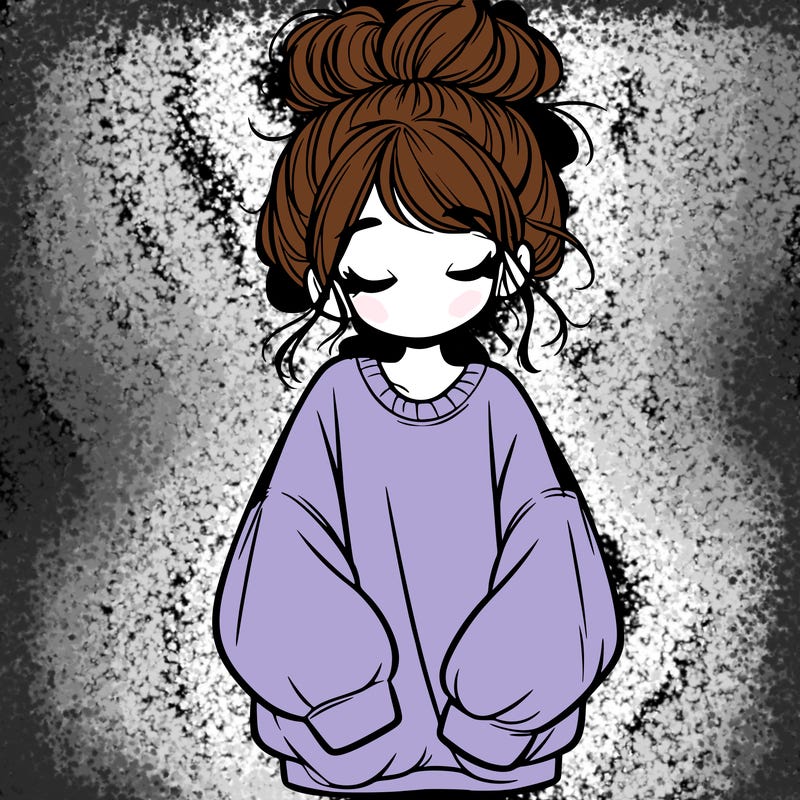 girl with baggy sweatshirt and messy bun