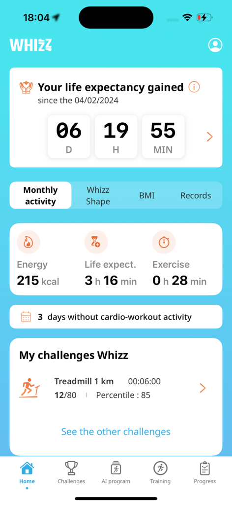 Pantalla de inicio de la aplicación Whizz que muestra la esperanza de vida ganada y las métricas de actividad cardiovascular mensual.