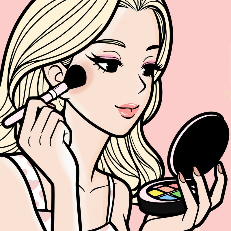 little girl putting on makeup