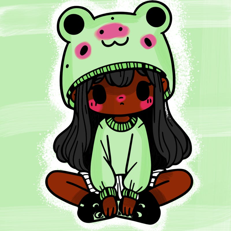 a girl wearing a frog hat and some frog socks