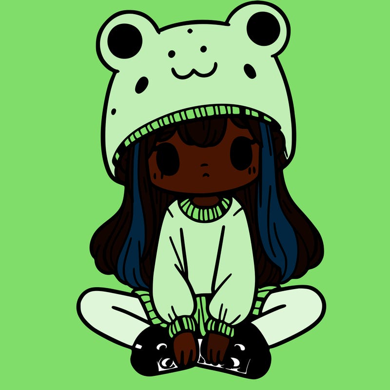 a girl wearing a frog hat and some frog socks