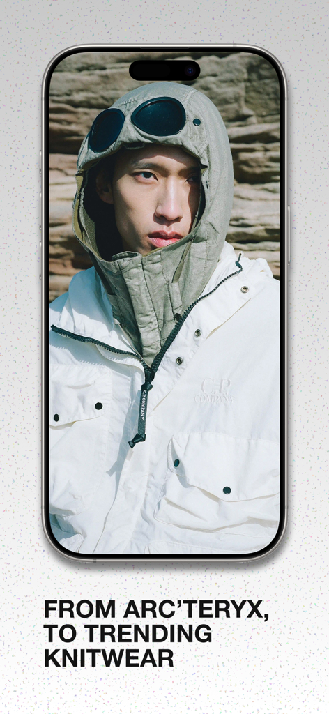 Model wearing a CP Company goggle jacket on the SEVENSTORE app showcasing high-end streetwear