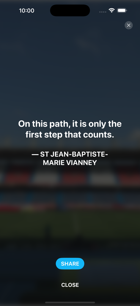 Gratitude by GratefulDay - A mobile app screen showing an inspirational quote about taking the first step with a share button.