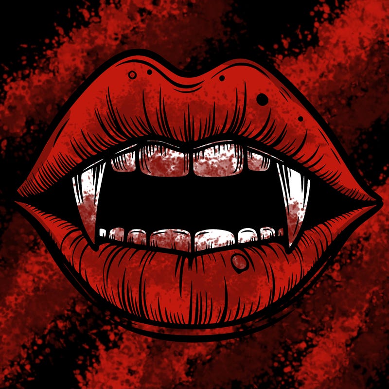 lips with vampire teeth