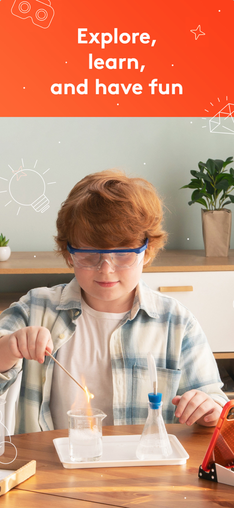 Un niño con gafas de seguridad realiza un experimento de química con vasos de precipitados y una llama