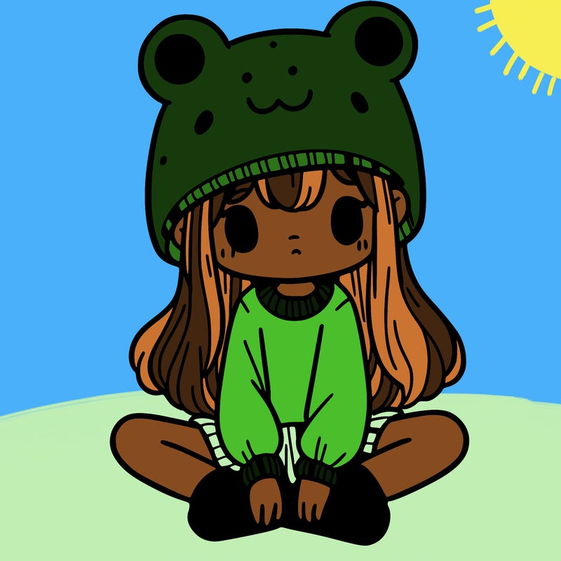 a girl wearing a frog hat and some frog socks