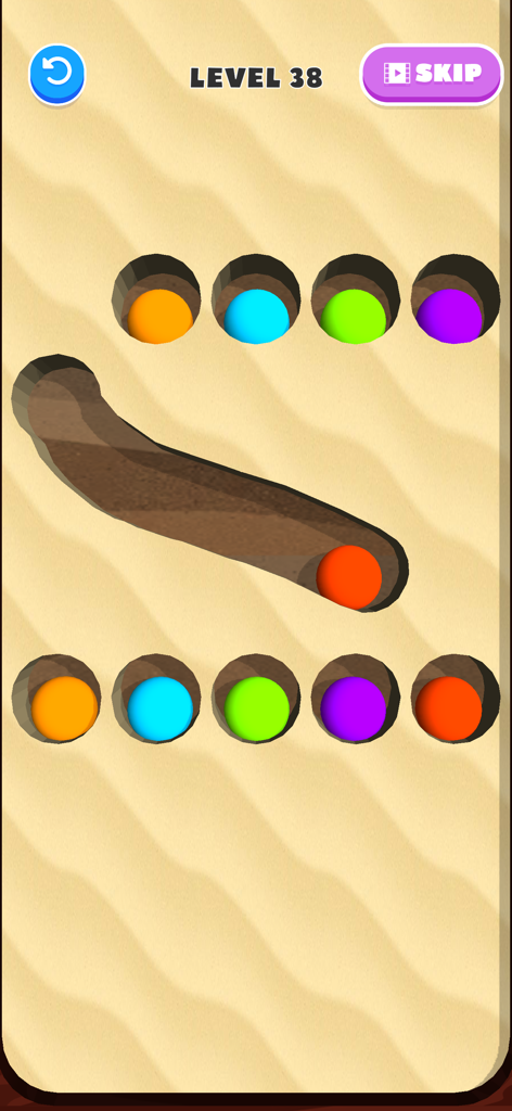 Brain Dig - Digging Puzzle - - Gameplay of Brain Dig showing a ball rolling through a dug path in the sand to merge with matching colors
