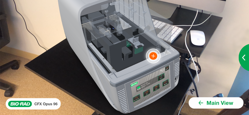 Bio-Rad AR - Augmented reality view of the Bio-Rad CFX Opus 96 real-time PCR system on a desk showing internal components