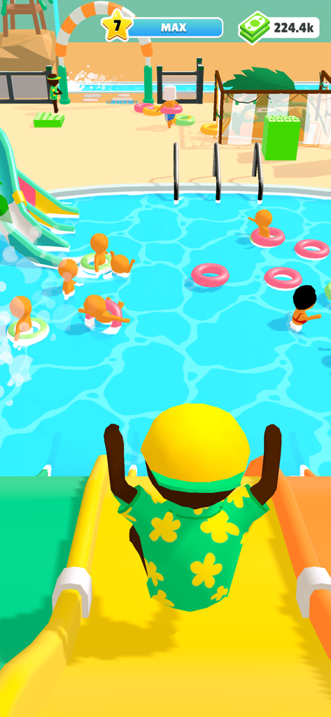 WaterPark Boys - Un personaje deslizándose por un tobogán de agua amarillo hacia una piscina abarrotada en el juego WaterPark Boys.