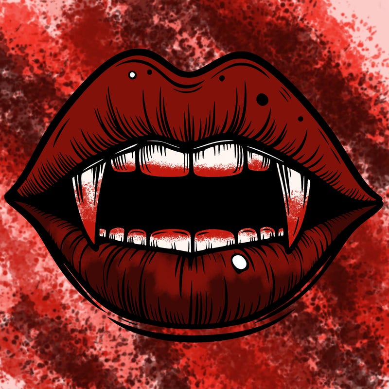 lips with vampire teeth